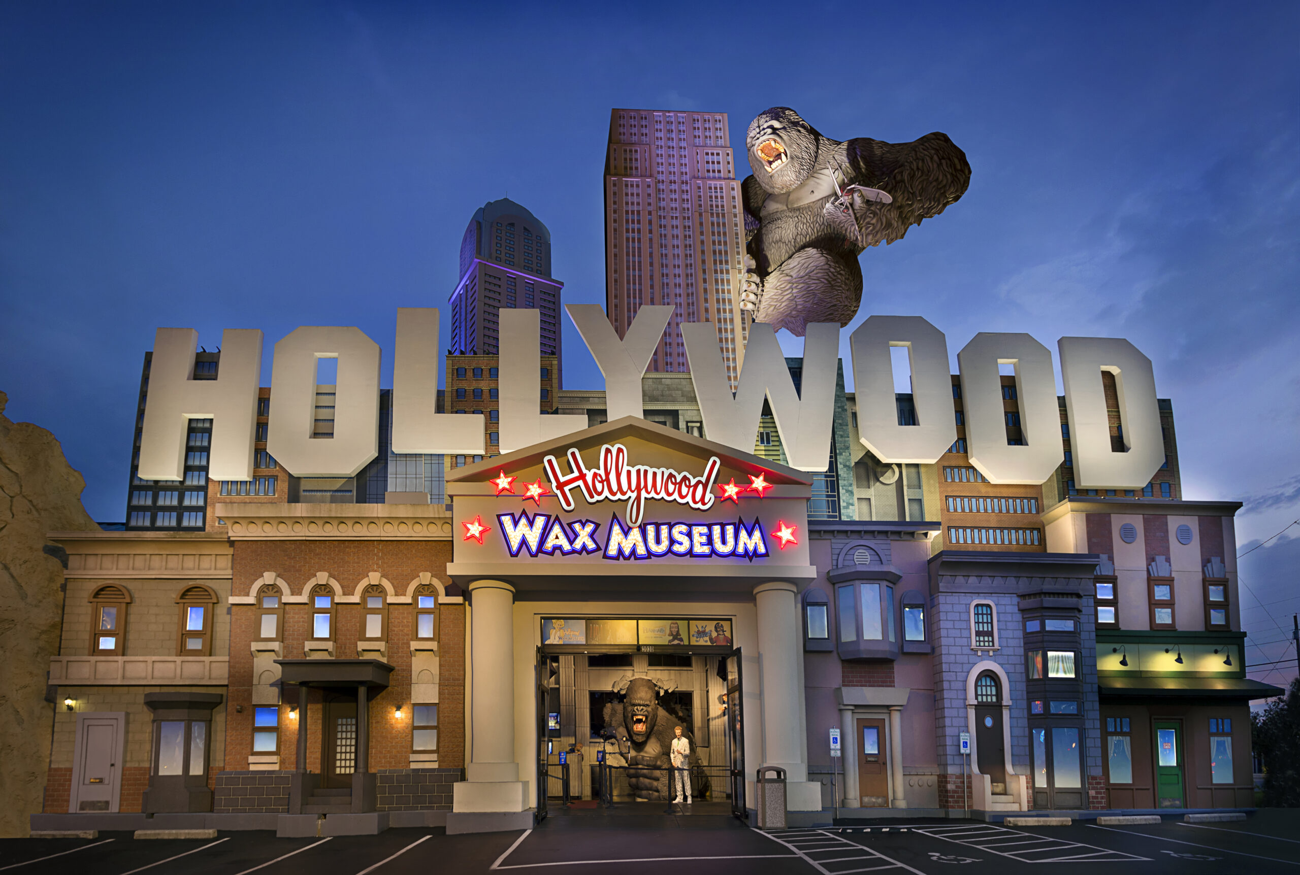 the hollywood wax museum is lit up at night